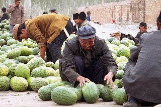 45 Kashgar Sunday Market 1993 Selling Melons